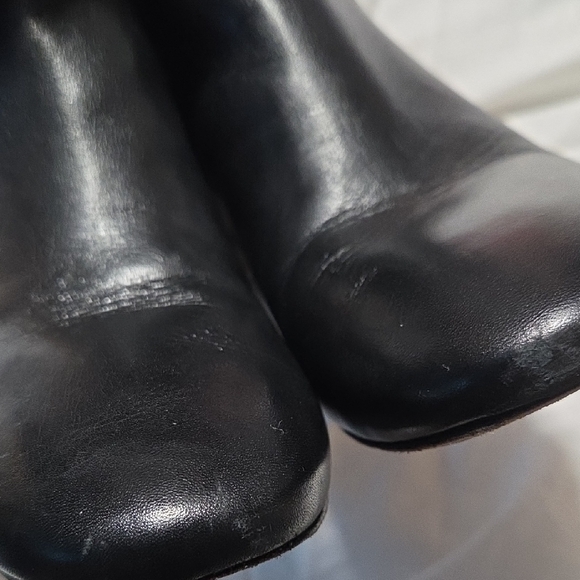 Tory Burch Black Heeled Boots with Gold Accent - Picture 16 of 16